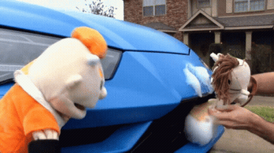 Two Stuffed Animals Cleaning Blue Car GIF
