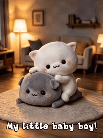 Two Stuffed Animals Laying On Top Of Each Other With The Words " My Little Baby Boy " Above Them GIF