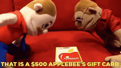 Two Stuffed Animals Looking At An Applebee Gift Card GIF