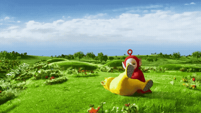 Two Stuffed Animals Lying In Grass GIF