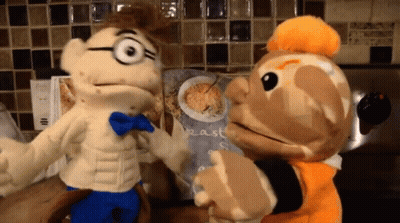 Two Stuffed Animals Next To Oatmeal Cereal Bag GIF