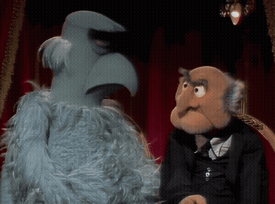 Two Stuffed Animals On Red Chair GIF
