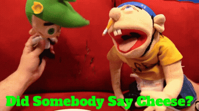 Two Stuffed Animals On Red Couch Did Somebody Say Cheese GIF