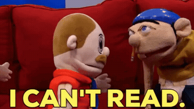 Two Stuffed Animals On Red Couch Saying I Can't Read GIF