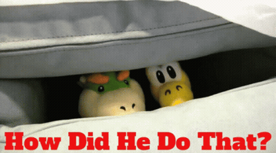 Two Stuffed Animals Peeking Under Blanket How Did He Do That GIF