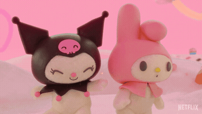 Two Stuffed Animals Standing Next to Each Other With Netflix