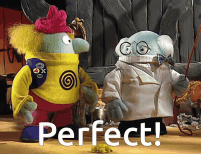 Two Stuffed Animals Standing Next To Each Other With Perfect GIF