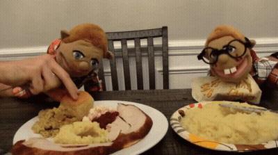 Two Stuffed Animals With Turkey And Mashed Potatoes GIF