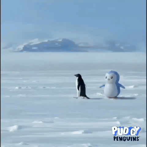 Two Stuffed Penguins Are Walking In The Snow With Pucky Penguins Written On The Bottom Right GIF