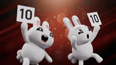 Two Stuffed Rabbits Are Holding Up Signs With The Number 10 On Them GIF