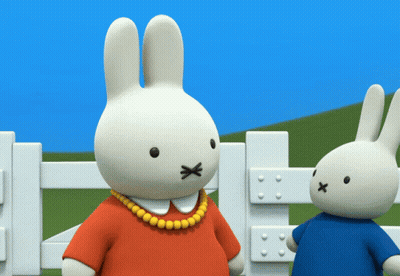 Two Stuffed Rabbits With Crossed Noses GIF