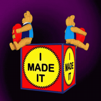 Two Teddy Bears Are Sitting On Top Of A Box That Says I Made It GIF
