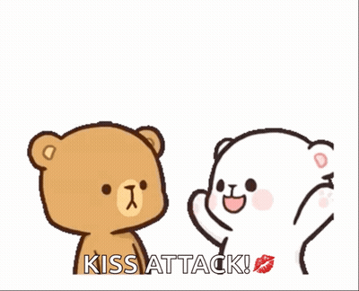 Two Teddy Bears Are Standing Next To Each Other With The Words Kiss Attack Written On The Bottom . GIF