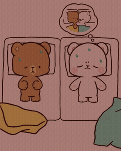 Two Teddy Bears Laying On Bed GIF
