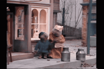 Two Teddy Bears Outside Store GIF