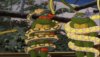 Two Teenage Mutant Ninja Turtles Being Eaten By Snake GIF