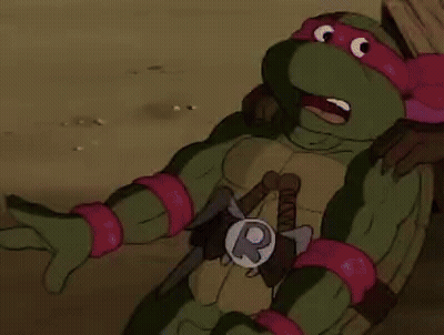 Two Teenage Mutant Ninja Turtles Reading On Couch GIF