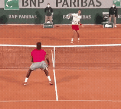 Two Tennis Players Are Playing On A Court With Bnp Paribas Advertisements In The Background GIF