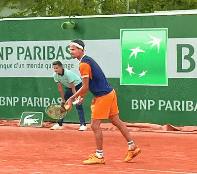 Two Tennis Players On A Court With A Bnp Paribas Banner Behind Them GIF