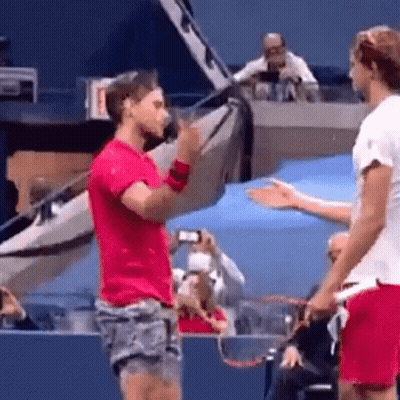 Two Tennis Players Standing GIF