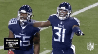 Two Titans Football Players Celebrating Touchdown GIF