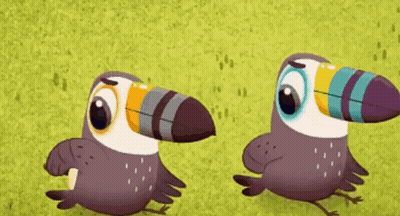 Two Toucans Standing In Green Field GIF
