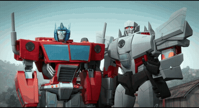 Two Transformers One With Blue Head GIF