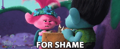Two Trolls Are Standing Next To Each Other And The Word For Shame Is On The Screen GIF
