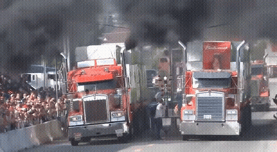 Two Trucks With Budweiser GIF