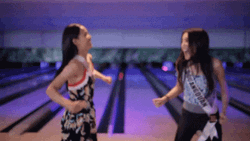 Two Woman Laughing Bowling Alley GIF