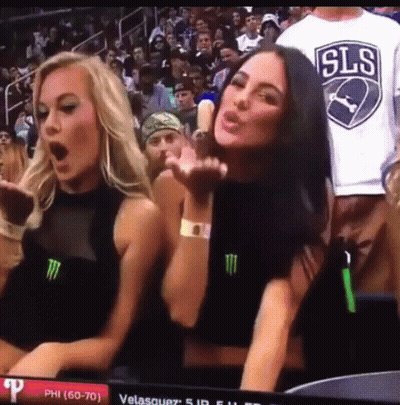 Two Women And Man In SLS Shirt Stadium GIF