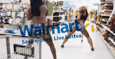 Two Women Are Dancing In A Walmart Store With The Slogan Save Money Live Better GIF