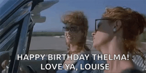 Two Women Are Driving A Car And One Of Them Is Wearing Glasses . GIF
