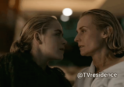 Two Women Are Looking At Each Other With A Caption That Says Tvresidence . GIF