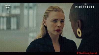 Two Women Are Looking At Each Other With The Words The Peripheral Behind Them GIF