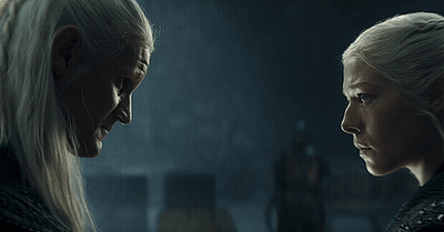 Two Women Are Looking At Each Other With The Words Winter Is Coming Above Them GIF