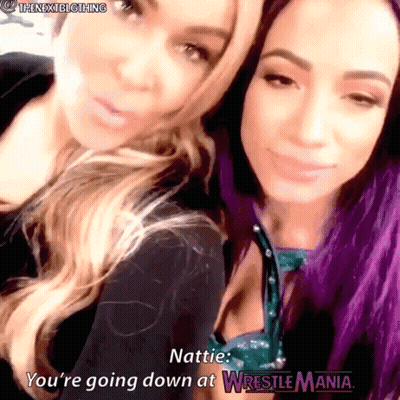 Two Women Are Posing For A Picture And One Of Them Says " Nattie " GIF