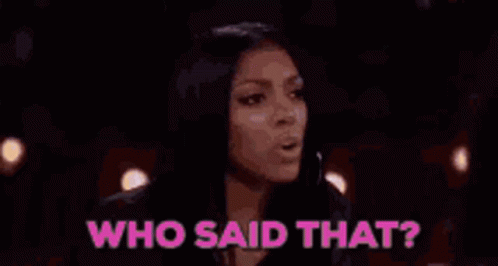 Two Women Are Sitting At A Table With Glasses Of Water And Champagne And The Words `` Who Said That '' . GIF