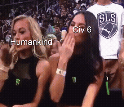 Two Women Are Sitting In A Crowd And One Of Them Is Wearing A Shirt That Says ' Sls ' On It GIF