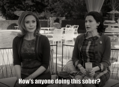 Two Women Are Sitting Next To Each Other With The Words How 'S Anyone Doing This Sober GIF