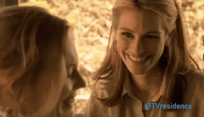 Two Women Are Smiling And Looking At Each Other With The Words Tvresidence In The Upper Right Corner GIF