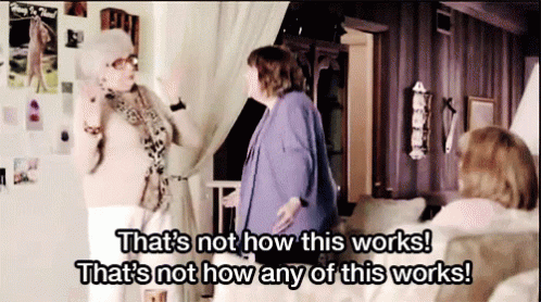 Two Women Are Standing In A Living Room And One Of Them Says That 'S Not How This Works GIF