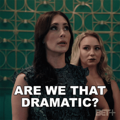 Two Women Are Standing Next To Each Other And One Of Them Is Asking Are We That Dramatic GIF