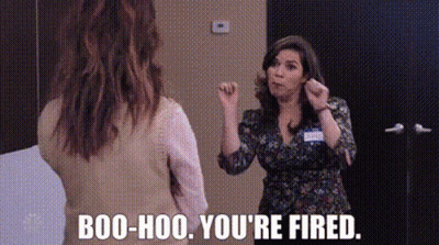 Two Women Are Standing Next To Each Other And One Of Them Is Saying `` Boo-Hoo , You 'Re Fired . `` GIF