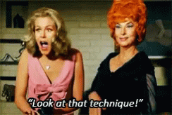 Two Women Are Standing Next To Each Other And One Of Them Is Saying " Look At That Technique " GIF