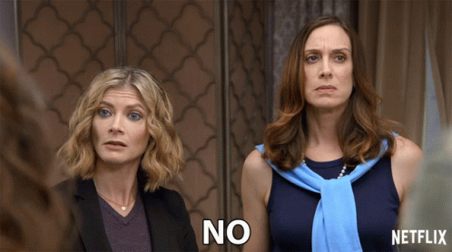 Two Women Standing One Saying No GIF