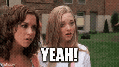 Two Women Are Standing Next To Each Other And One Of Them Is Saying `` Yeah '' . GIF
