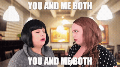 Two Women Are Standing Next To Each Other And One Of Them Is Saying You And Me Both You And Me Both GIF