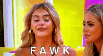 Two Women Are Standing Next To Each Other And One Of Them Is Wearing A Necklace That Says Fawk On It . GIF