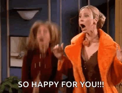 Two Women Are Standing Next To Each Other And One Of Them Is Wearing An Orange Fur Coat And Saying `` So Happy For You ! GIF